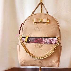 NWT Betsy Johnson med back pack with clutch.